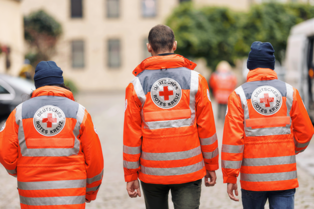 Drei ehrenamtliche Aktive des DRK beim Sanitätsdienst